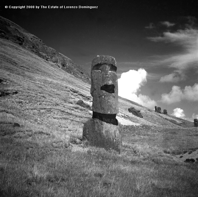 RRE_Baquedano_02.jpg - Easter Island. 1960. Moai on the exterior slope of Rano Raraku. Called "Baquedano" because of the sign painted on its neck by sailors of the homonym ship.