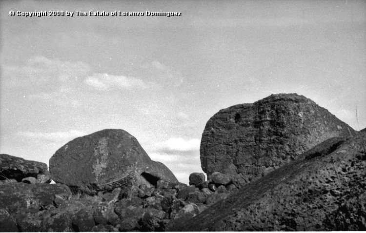 TAM_Moai_13.jpg - Easter Island. 1960. Ahu Tongariki. Fallen moai over the ahu wall. Photograph taken shortly before the destruction of the ahu by the tsunami of May 22, 1960.