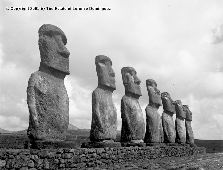 AKI_Conjunto_05.jpg - Easter Island. 1960. Ahu Akivi. General view of the ahu restored by the Chilean-American archeological expedition lead by William Mulloy in 1960.