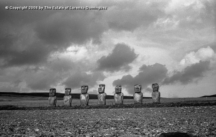 AKI_Conjunto_11.jpg - Easter Island. 1960. Ahu Akivi. General view of the ahu restored by the Chilean-American archeological expedition lead by William Mulloy in 1960.