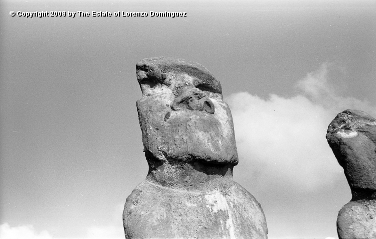 AKI_Detalle_12.jpg - Easter Island. 1960. Ahu Akivi. Detail of the central statue  Detail of  the ahu restored by the Chilean-American archeological expedition lead by William Mulloy in 1960.