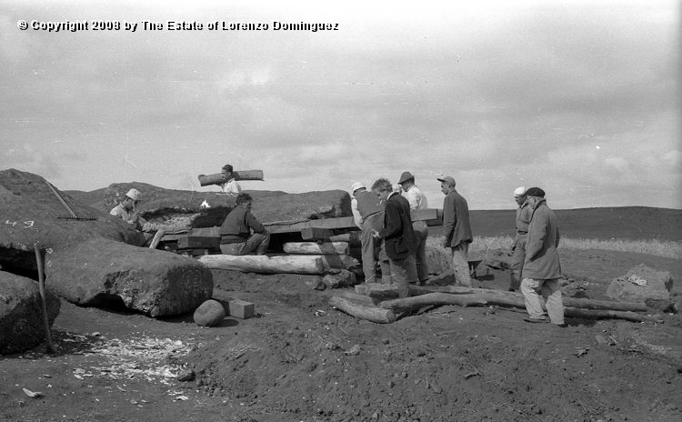 AKI_Tareas_02.jpg - Easter Island. 1960. Ahu Akivi. Raising the moai in 1960. Restoration of the ahu  by William Mulloy.